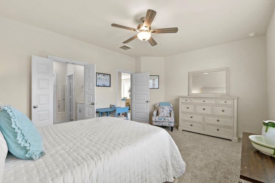 Furnished interior view inside a new home in Harper's Preserve - Traditional Series, Conroe (Image 25).