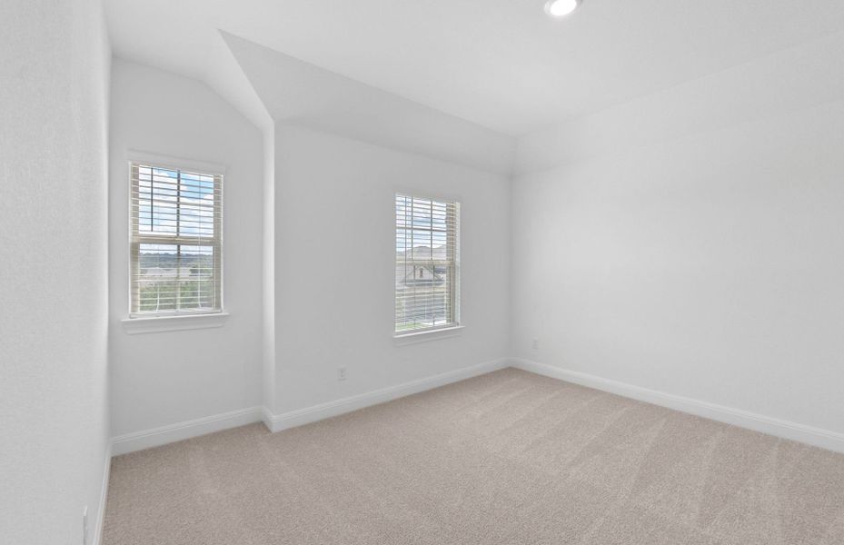 Spacious, unfurnished interior of a new home in Bluffview Reserve, Leander (Image 63).