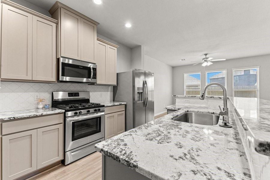 Furnished interior view inside a new home in Mill Creek Trails, Magnolia (Image 5).