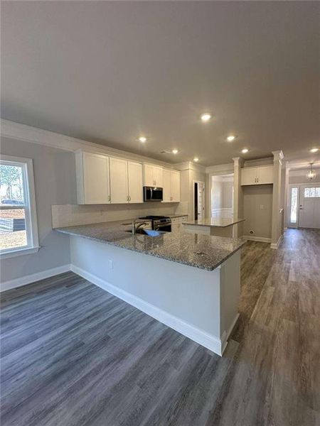 Furnished interior view inside a new home in Mirror Lake at South Harbour, Villa Rica (Image 4).