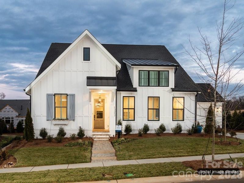 Front exterior of a new home in , Davidson, NC, highlighting curb appeal (Image 18).