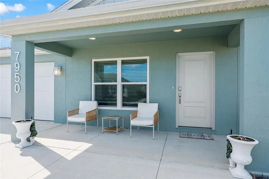 Exterior details and patio area of a home in , The Villages (Image 29).