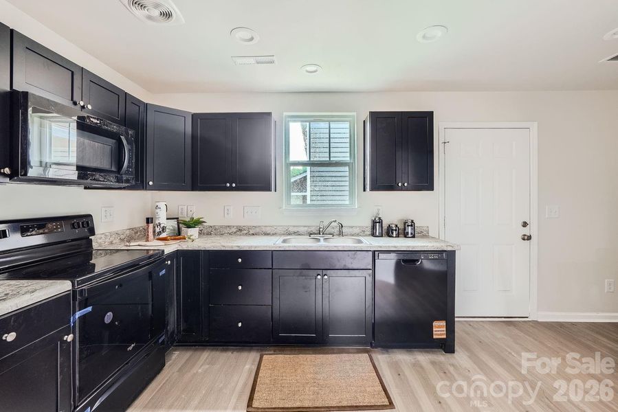 Furnished interior view inside a new home in , Charlotte (Image 7).