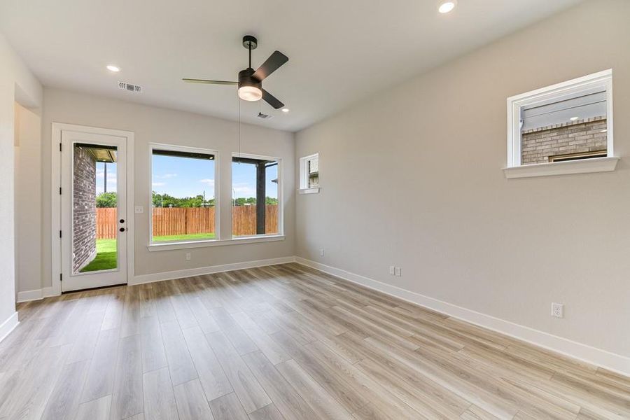 Thomasville Family Room  [Photo shown are from a completed home with the same floorplan and similar design selections. Actual design selections may very slightly]