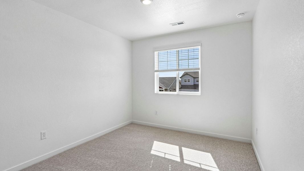 Spacious, unfurnished interior of a new home in Prairie Song, Windsor (Image 23).