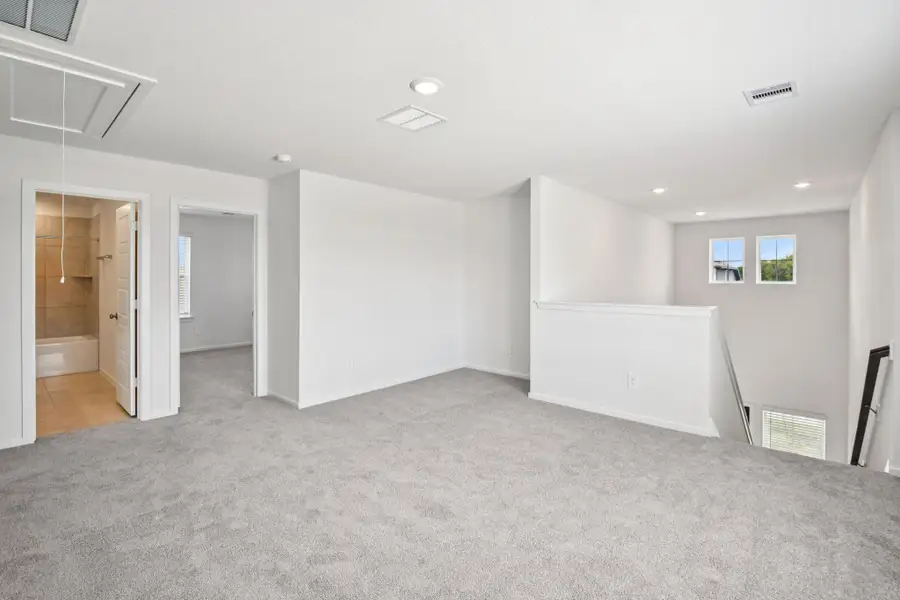 Spacious, unfurnished interior of a new home in Landing Meadows - Traditional Series, New Caney (Image 31).