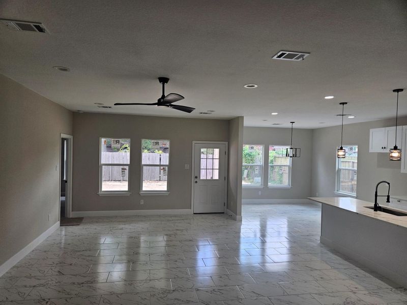 Spacious, unfurnished interior of a new home in , Humble (Image 11).