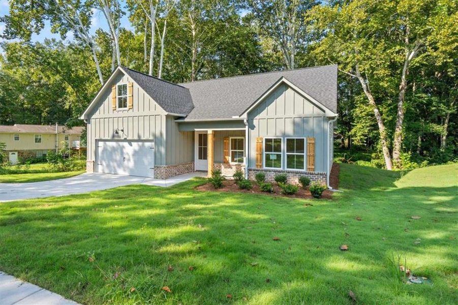 Front exterior of a new home in , Temple, GA, highlighting curb appeal (Image 20).