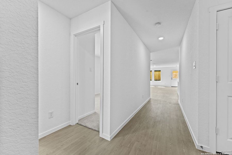 Spacious, unfurnished interior of a new home in Torian Village: Watermill Collection, San Antonio (Image 19).