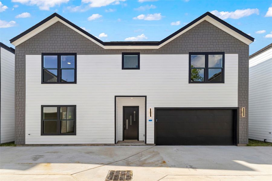 Front exterior of a new home in , Houston, TX, highlighting curb appeal (Image 15). Front exterior of a new home in , Houston, TX, highlighting curb appeal (Image 15).