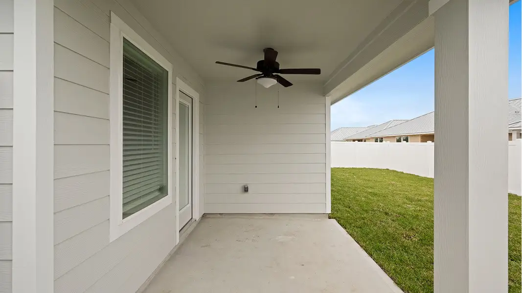 Exterior details and patio area of a home in The Islands of Rockport, Rockport (Image 3).