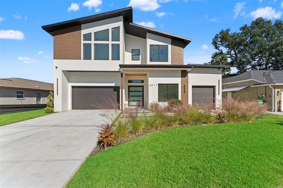 Front exterior of a new home in , Tampa, FL, highlighting curb appeal (Image 30). Front exterior of a new home in , Tampa, FL, highlighting curb appeal (Image 30).