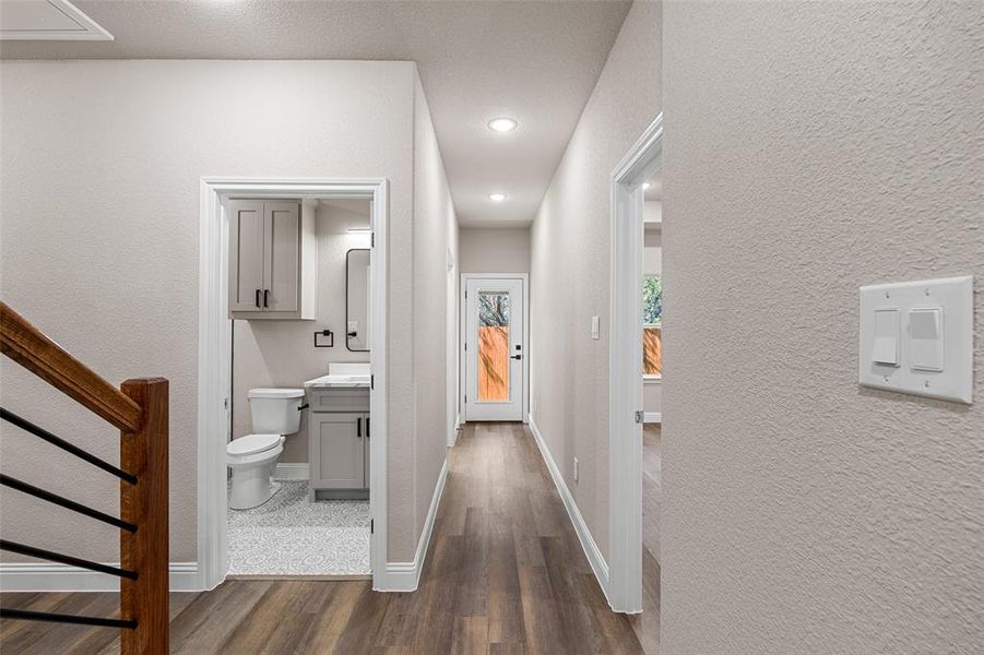 Hallway featuring dark hardwood / wood-style flooring