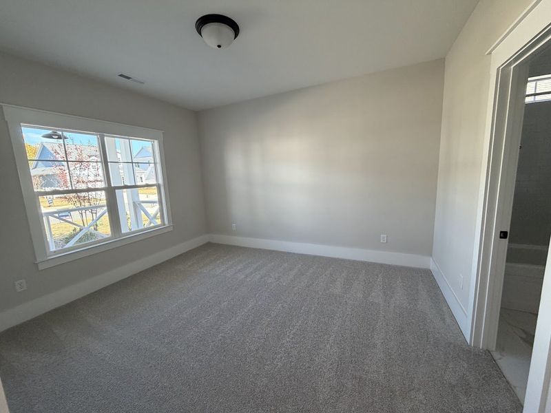 Spacious, unfurnished interior of a new home in Riverside Cove, Wilmington (Image 17).
