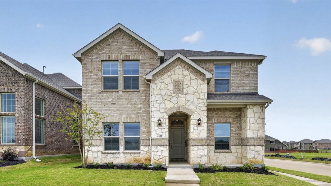 Representative exterior photo of a completed home built from the Rosemary by D.R. Horton in Lilybrooke at Legacy Hills, Celina, TX (Image 1). Representative exterior photo of a completed home built from the Rosemary by D.R. Horton in Lilybrooke at Legacy Hills, Celina, TX (Image 1).