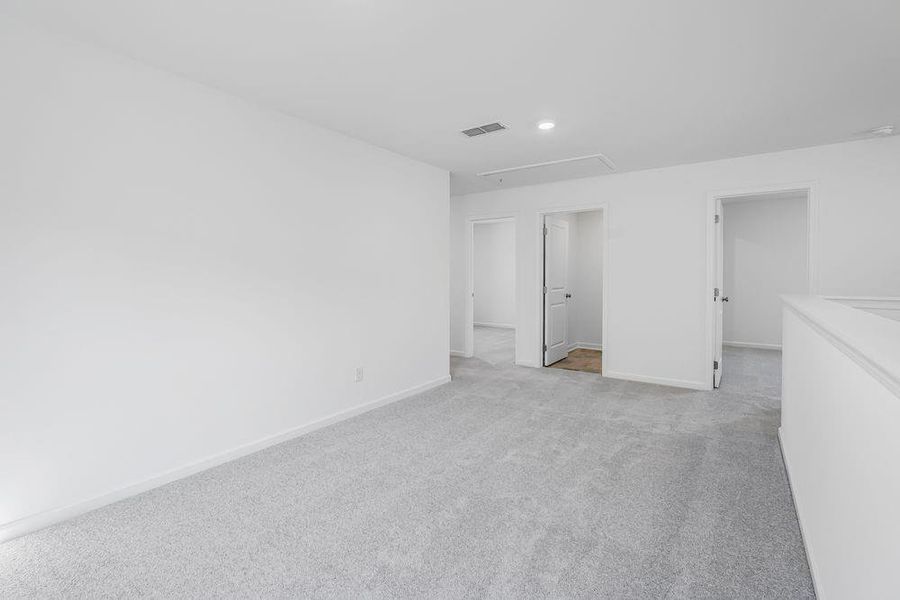 Spacious, unfurnished interior of a new home in Windance Lake, Loganville (Image 40).