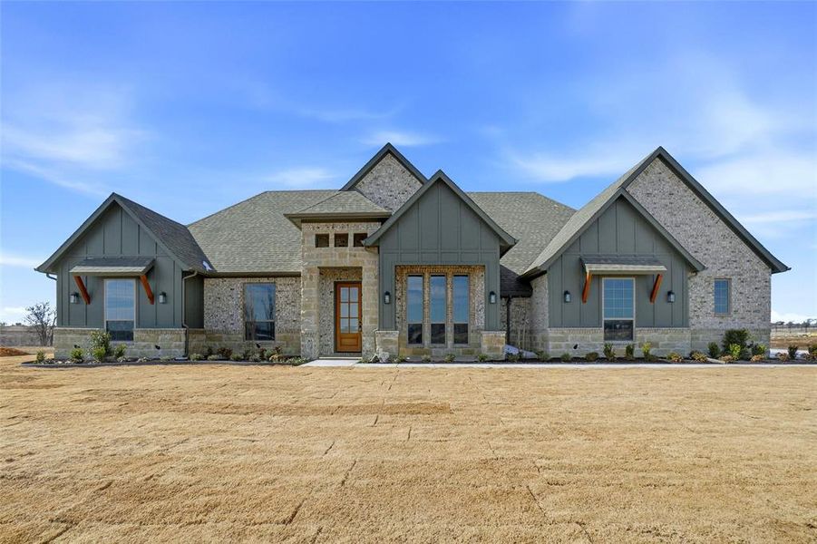 Front exterior of a new home in , Godley, TX, highlighting curb appeal (Image 25).