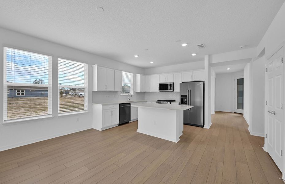 Furnished interior view inside a new home in Del Webb Wildlight, Yulee (Image 5).