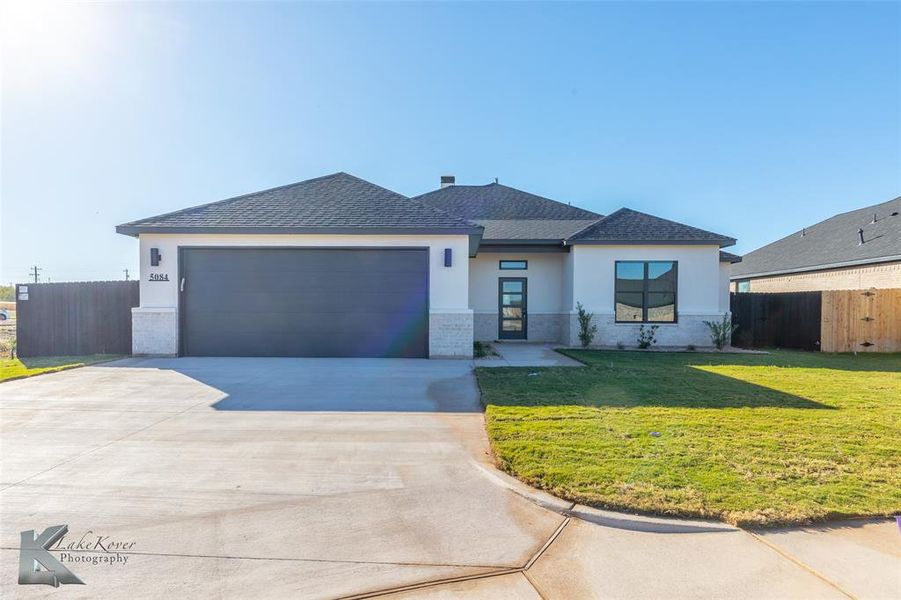 Front exterior of a new home in , Abilene, TX, highlighting curb appeal (Image 1). Front exterior of a new home in , Abilene, TX, highlighting curb appeal (Image 1).