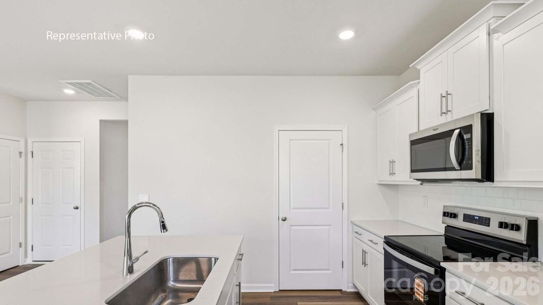 Furnished interior view inside a new home in Secrest Commons, Monroe (Image 6).