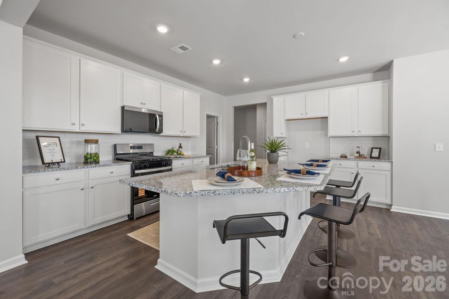 Furnished interior view inside a new home in McFarland Estates, York (Image 10).
