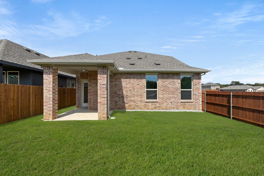 Front exterior of a new home in Keeneland, Aubrey, TX, highlighting curb appeal (Image 27).