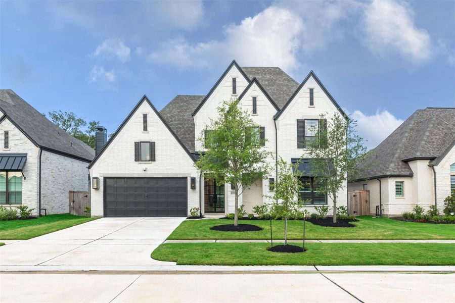 Front exterior of a new home in Fulbrook on Fulshear Creek: 60ft. lots, Fulshear, TX, highlighting curb appeal (Image 24). Front exterior of a new home in Fulbrook on Fulshear Creek: 60ft. lots, Fulshear, TX, highlighting curb appeal (Image 24).