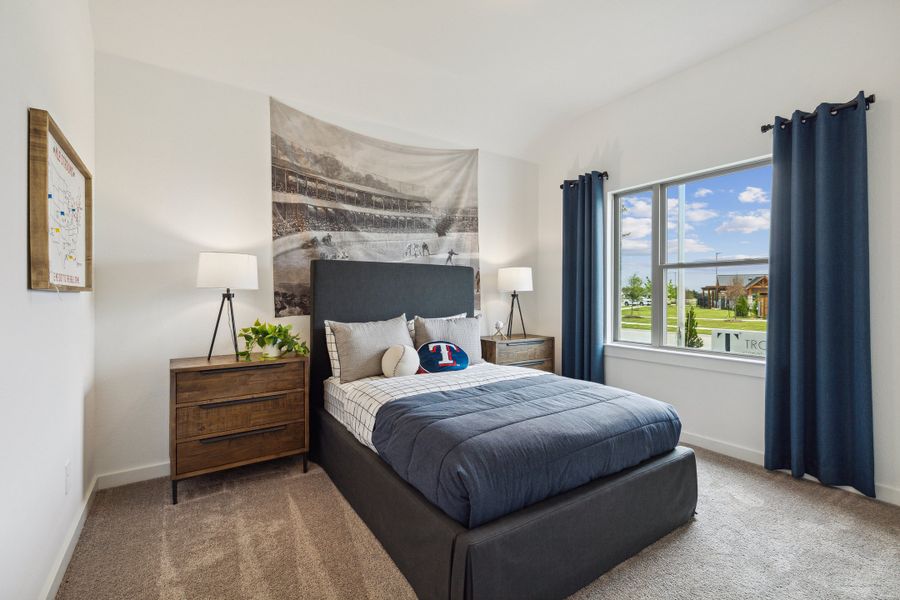 Bedroom in the Gilmour home plan by Trophy Signature Homes – REPRESENTATIVE PHOTO
