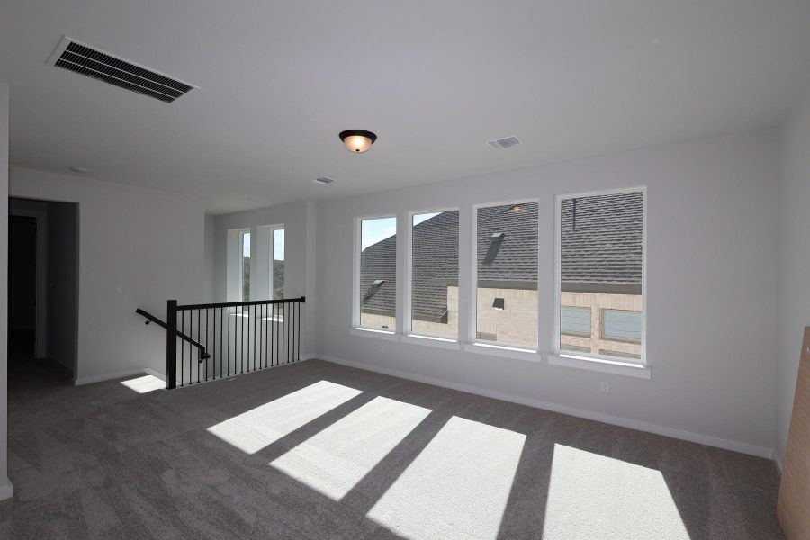 Spacious, unfurnished interior of a new home in Lariat, Liberty Hill (Image 22).