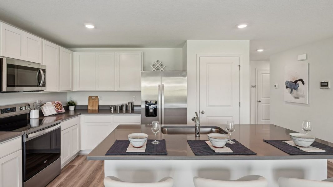 Furnished interior view inside a new home in Sunset Hills, Summerfield (Image 8).