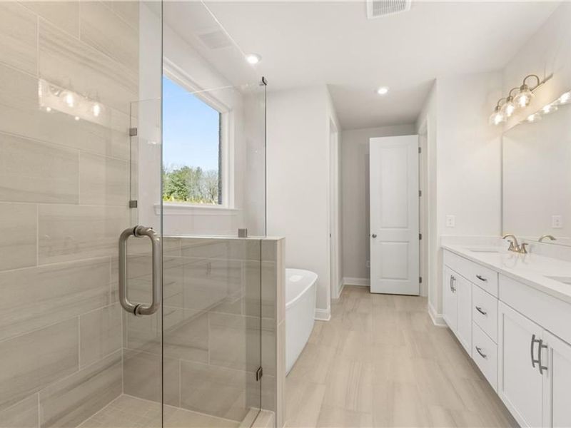 Furnished interior view inside a new home in Melody Lakeside Estates, Buford (Image 8).