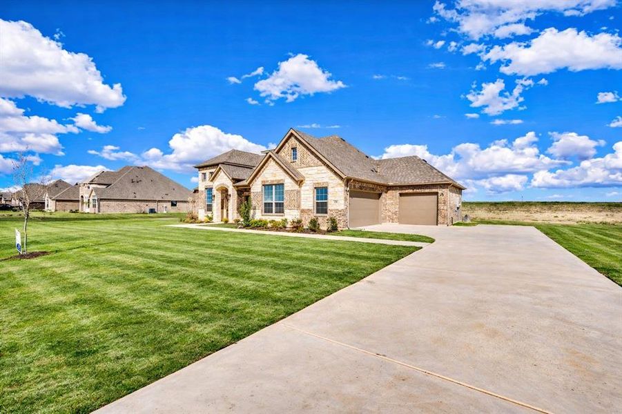 Front exterior of a new home in Levante, Waxahachie, TX, highlighting curb appeal (Image 24).
