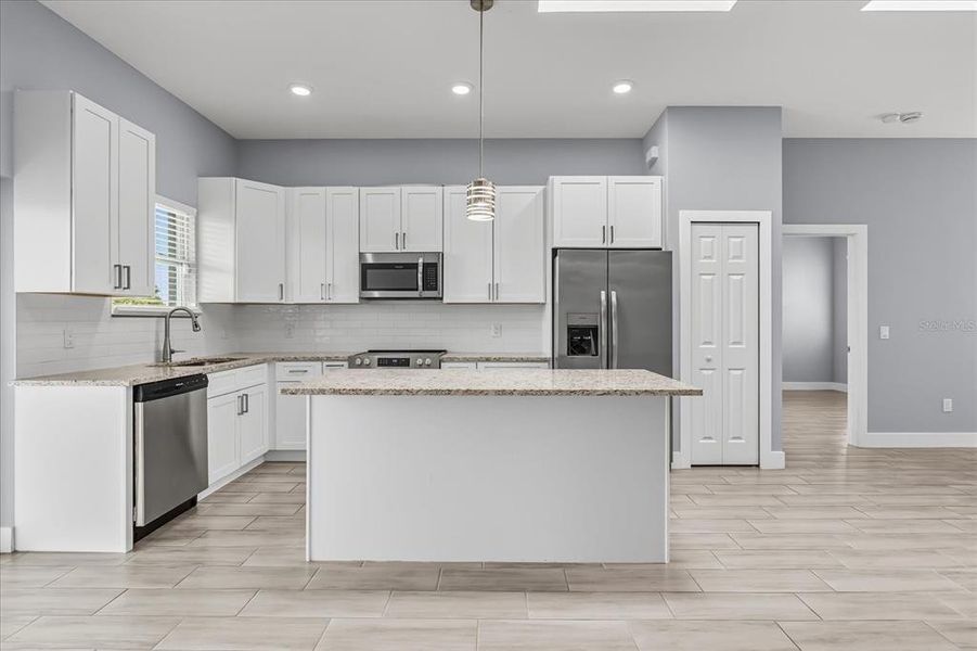 Furnished interior view inside a new home in , Kissimmee (Image 3).
