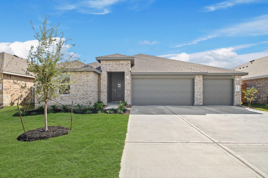 Front exterior of a new home in River Ranch Meadows, Dayton, TX, highlighting curb appeal (Image 11).