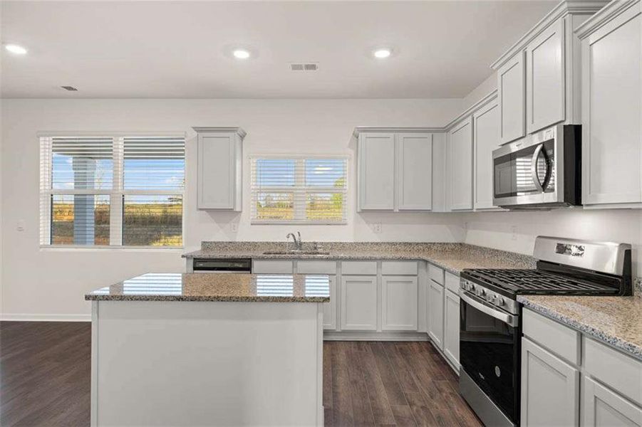 Furnished interior view inside a new home in Oakchase at Hampton, Hampton (Image 7).