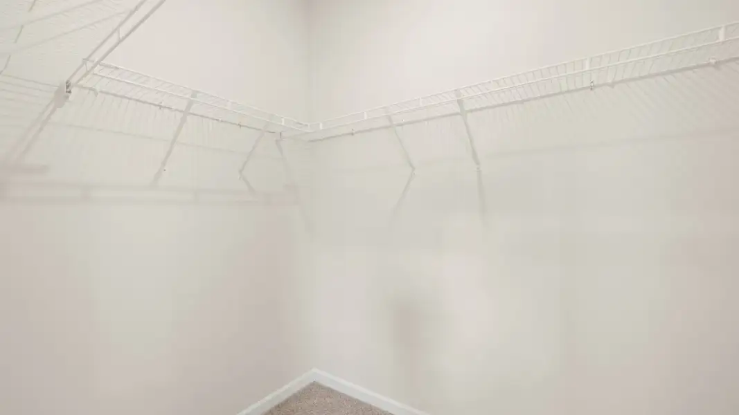 Representative unfurnished interior of a home built from the Kerry by D.R. Horton in Walden Ridge, Macon (Image 24).