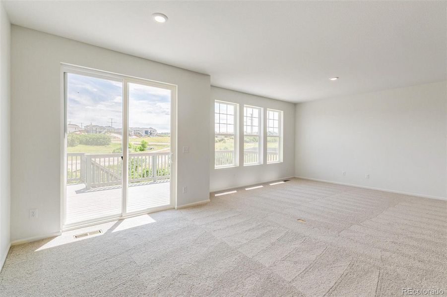 Spacious, unfurnished interior of a new home in Terrain Oak Valley, Castle Rock (Image 29).