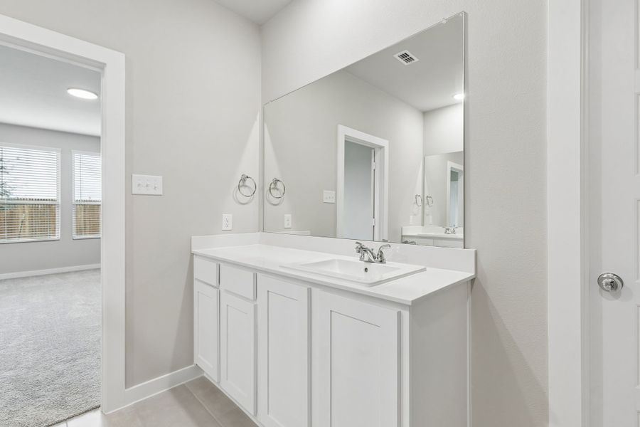 Primary Bathroom in the Winters home plan by Trophy Signature Homes – REPRESENTATIVE PHOTO