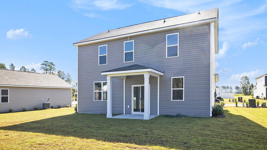 Exterior details and patio area of a home in Stanbury Creek, Supply (Image 3).