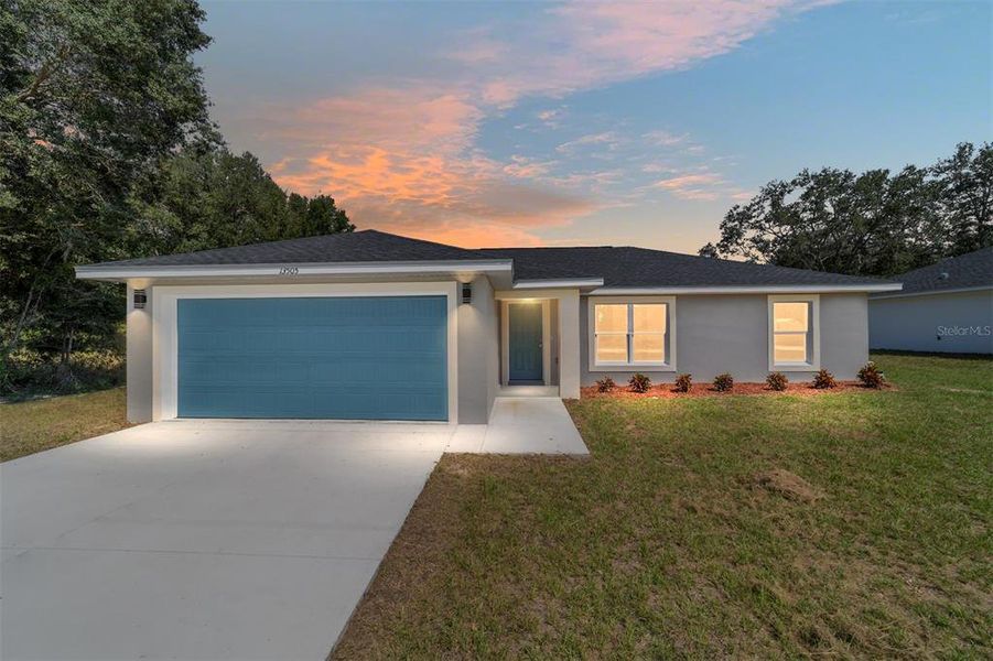 Front exterior of a new home in , Dunnellon, FL, highlighting curb appeal (Image 19).