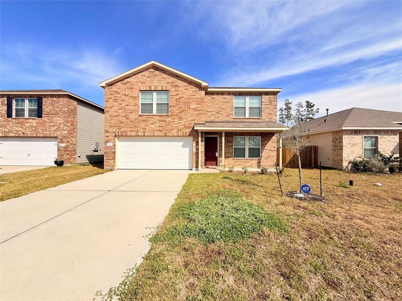 Front exterior of a new home in Grand Oaks Reserve, Cleveland, TX, highlighting curb appeal (Image 1). Front exterior of a new home in Grand Oaks Reserve, Cleveland, TX, highlighting curb appeal (Image 1).