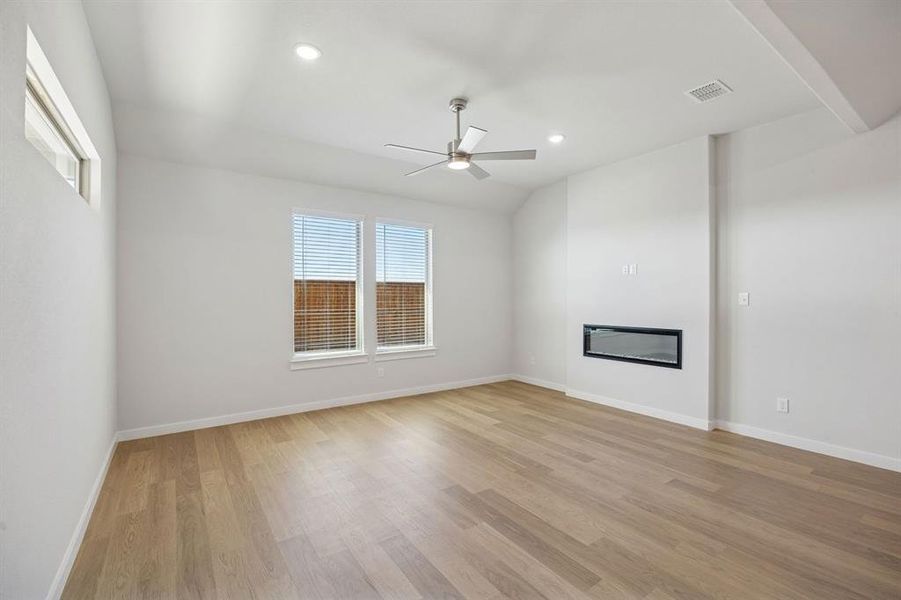 Living Room in the Wimbledon home plan by Trophy Signature Homes – REPRESENTATIVE PHOTO