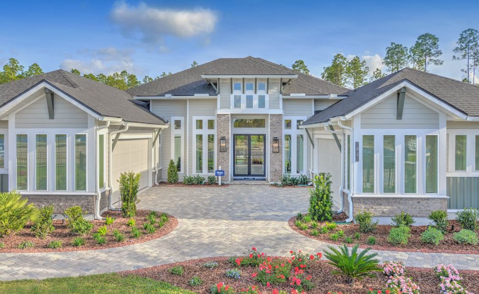 Front exterior of a new home in SilverLeaf, St. Augustine, FL, highlighting curb appeal (Image 2). Front exterior of a new home in SilverLeaf, St. Augustine, FL, highlighting curb appeal (Image 2).