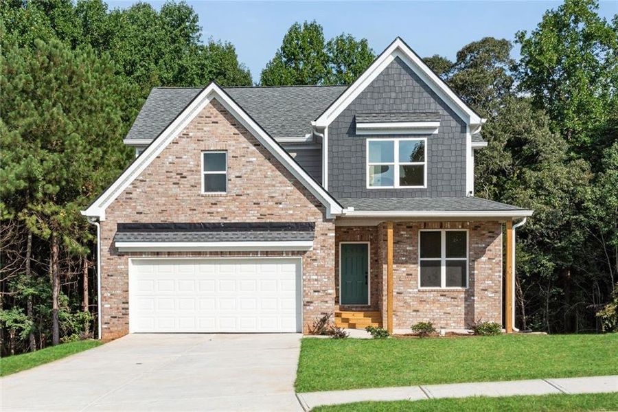 Front exterior of a new home in , Ellenwood, GA, highlighting curb appeal (Image 22).
