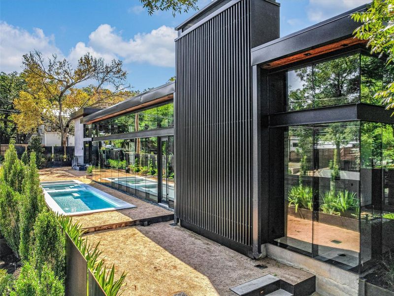 Front exterior of a new home in , Austin, TX, highlighting curb appeal (Image 22). Front exterior of a new home in , Austin, TX, highlighting curb appeal (Image 22).