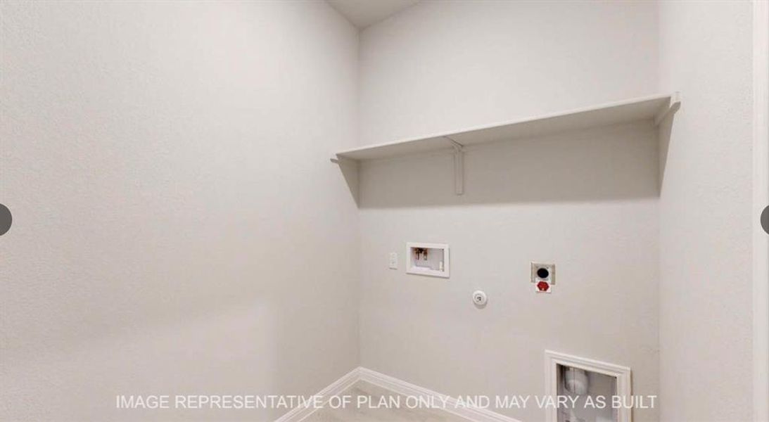 Laundry area featuring laundry area, hookup for an electric dryer, hookup for a gas dryer, washer hookup, and baseboards Laundry area featuring laundry area, hookup for an electric dryer, hookup for a gas dryer, washer hookup, and baseboards