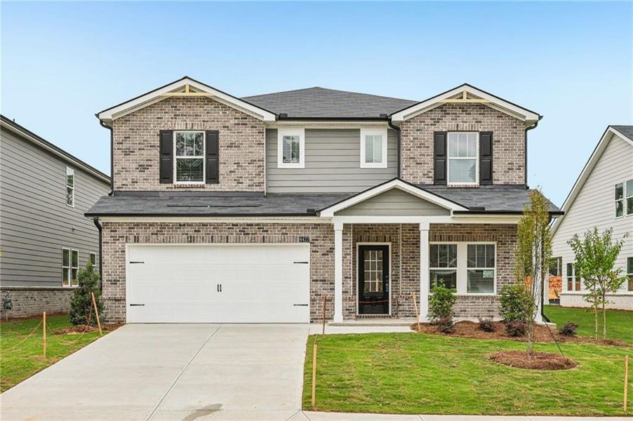 Front exterior of a new home in Westmont Preserve, Powder Springs, GA, highlighting curb appeal (Image 2).