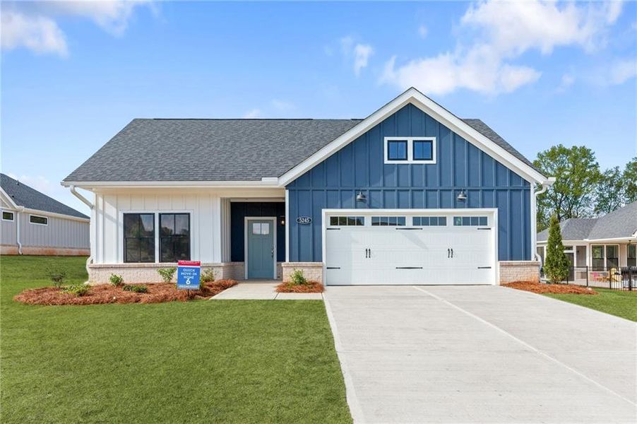 Front exterior of a home in the The Courtyards of Franklin Goldmine community, located in Cumming, GA (Image 18).