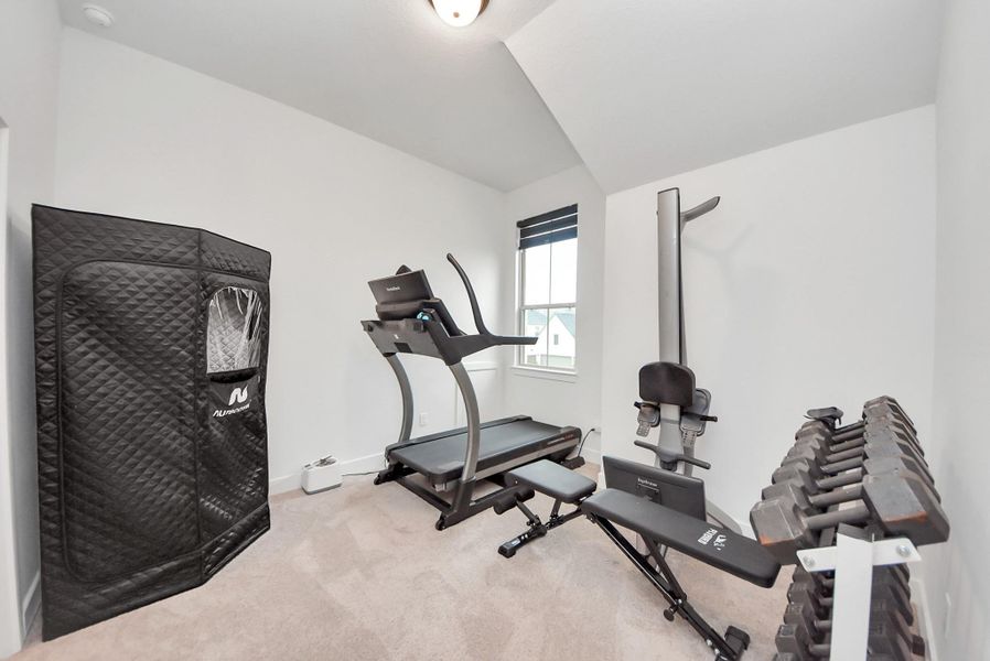 Bedroom 5 upstairs, currently converted into a private home gym.