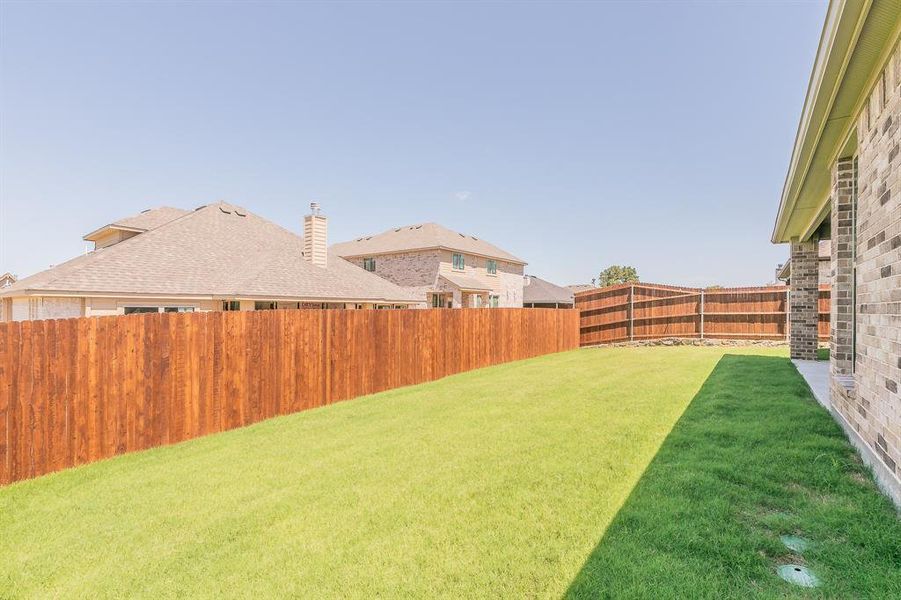 Front exterior of a new home in , Alvarado, TX, highlighting curb appeal (Image 20).